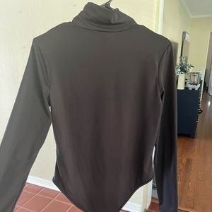 Black mock turtleneck bodysuit